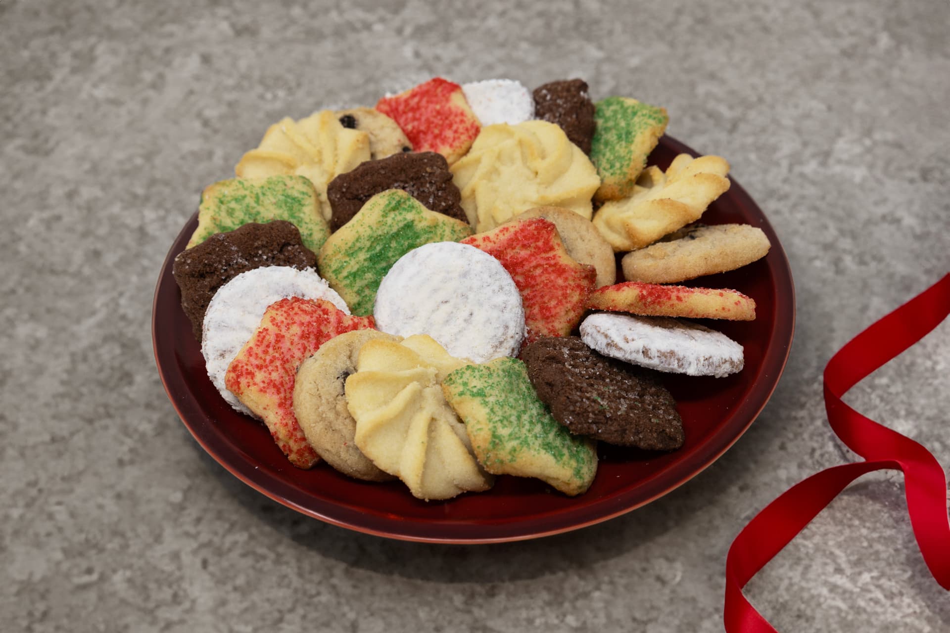 Holiday cookie box tied with ribbon